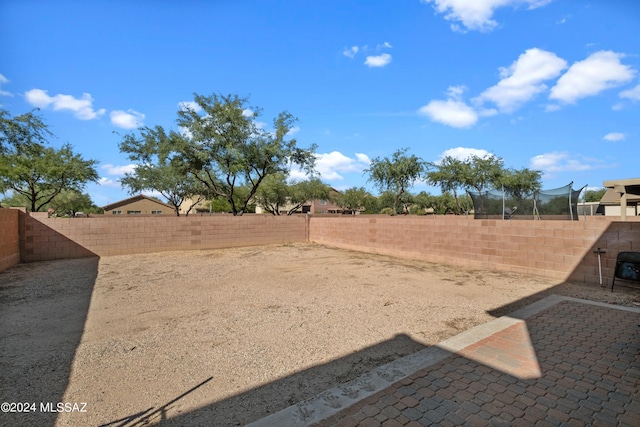 398 W Cedar Chase Dr, Green Valley, AZ 85614 - view of yard featuring a patio and a fenced backyard