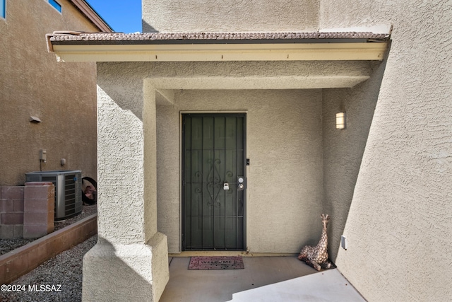 398 W Cedar Chase Dr, Green Valley, AZ 85614 - entrance to property with central AC unit and stucco siding