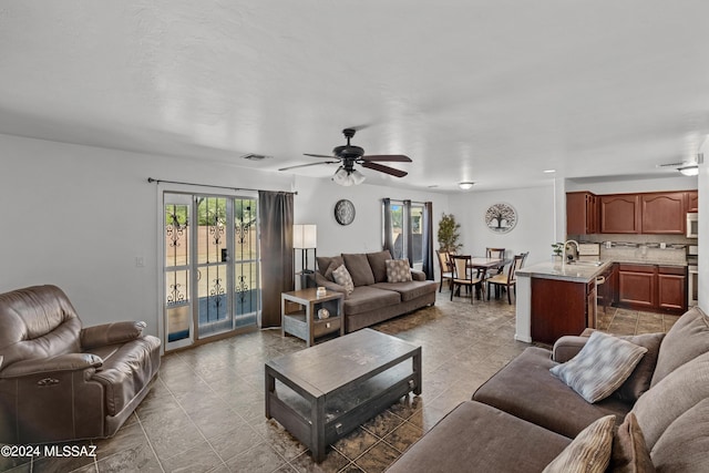 398 W Cedar Chase Dr, Green Valley, AZ 85614 - living room with visible vents and ceiling fan
