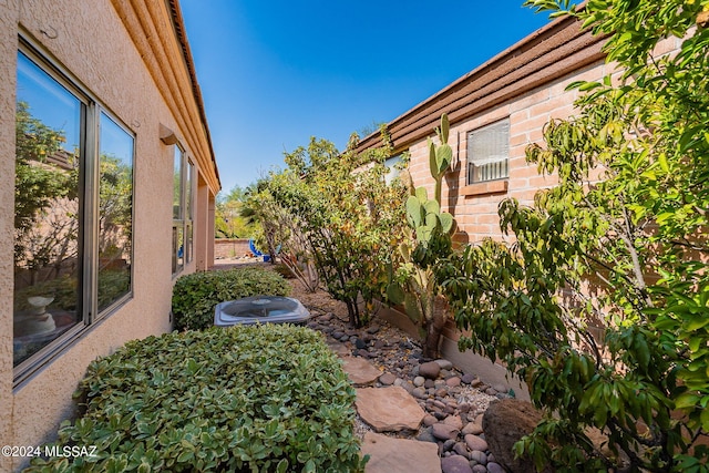 view of yard featuring central AC