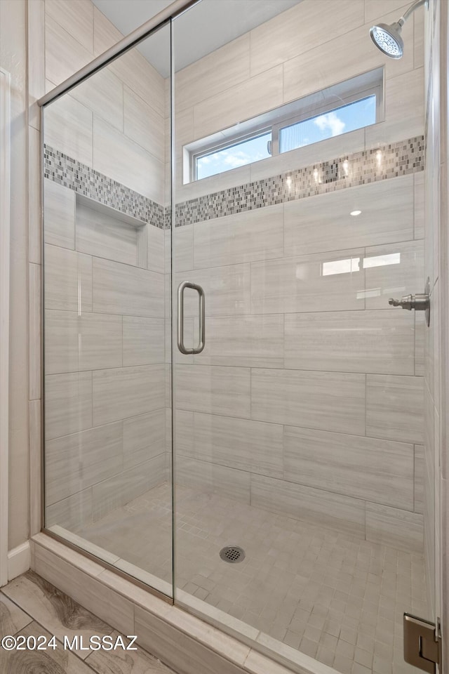 bathroom featuring walk in shower