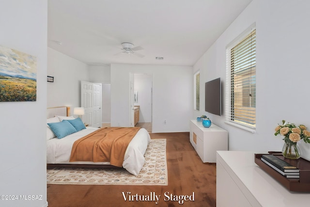 bedroom with ceiling fan and ensuite bathroom