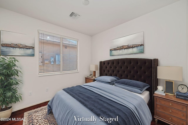 bedroom featuring hardwood / wood-style flooring