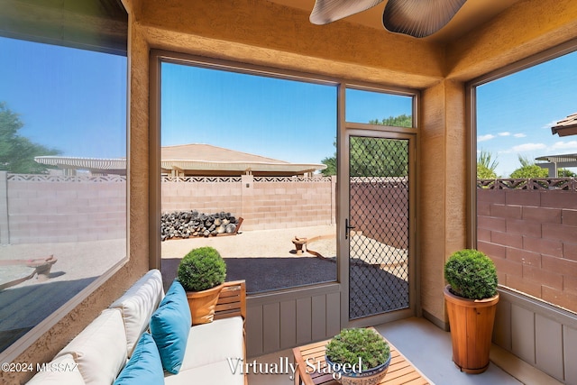 view of patio featuring ceiling fan