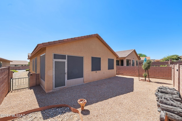 back of house featuring a patio area