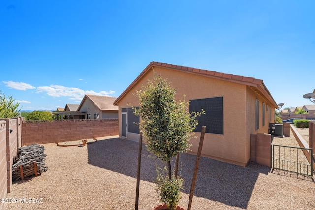 view of home's exterior featuring a patio area