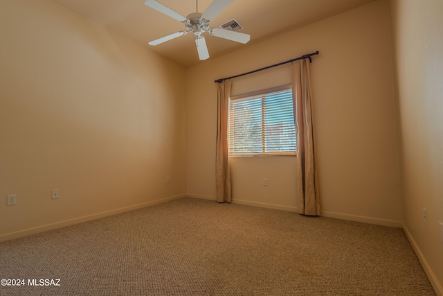 empty room with light carpet and ceiling fan