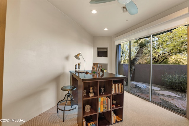 office with carpet flooring and ceiling fan