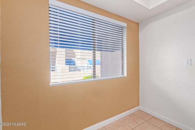 view of tiled spare room