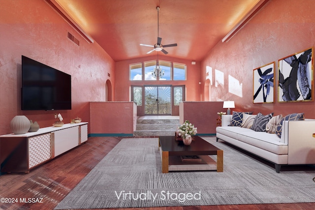 living room with ceiling fan, hardwood / wood-style floors, and high vaulted ceiling