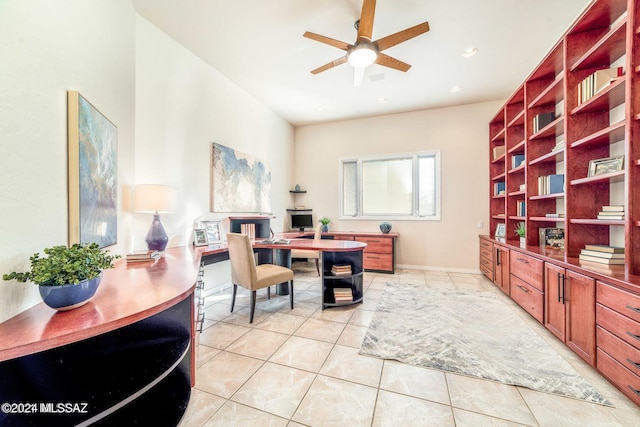 tiled office space with ceiling fan