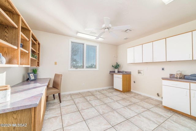 tiled office featuring ceiling fan and sink