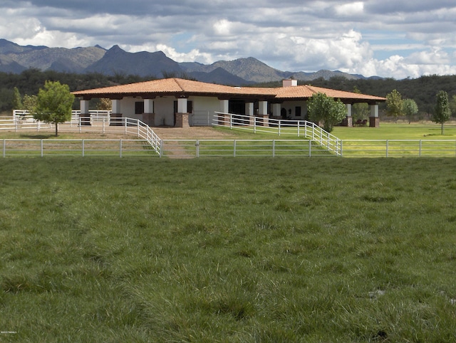 exterior space with a mountain view and a rural view