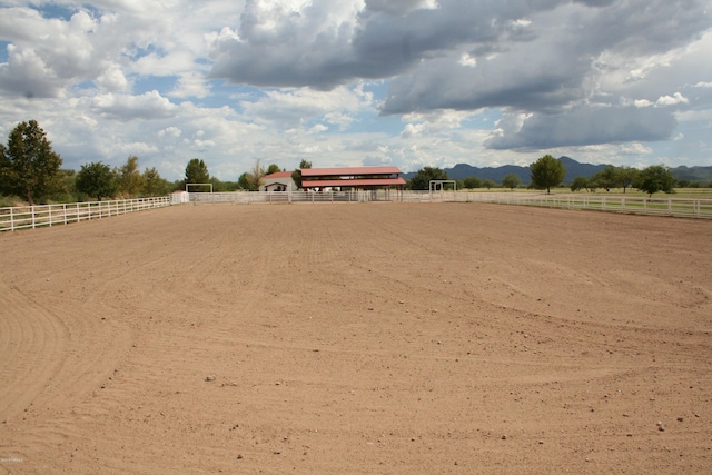 surrounding community with a mountain view and a rural view