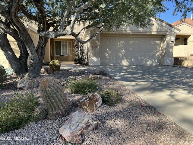 ranch-style home with a garage