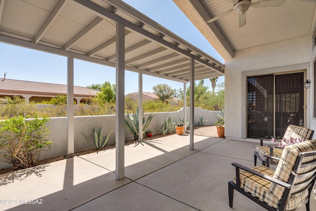 view of patio featuring a fenced backyard and ceiling fan