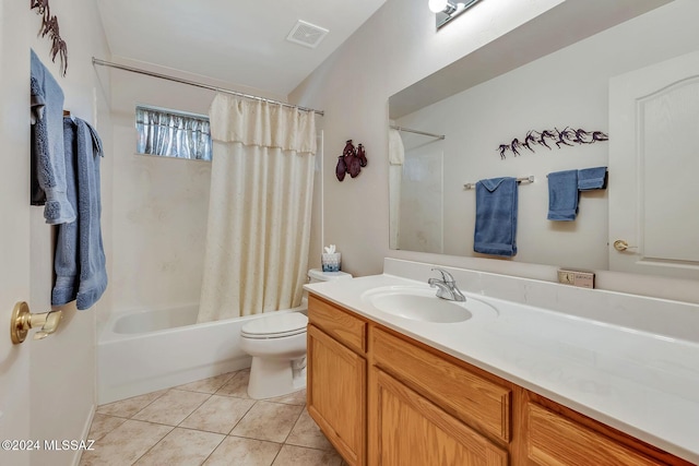 full bathroom featuring toilet, tile patterned flooring, shower / tub combo, and vanity