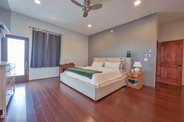 bedroom featuring ceiling fan and dark wood-type flooring