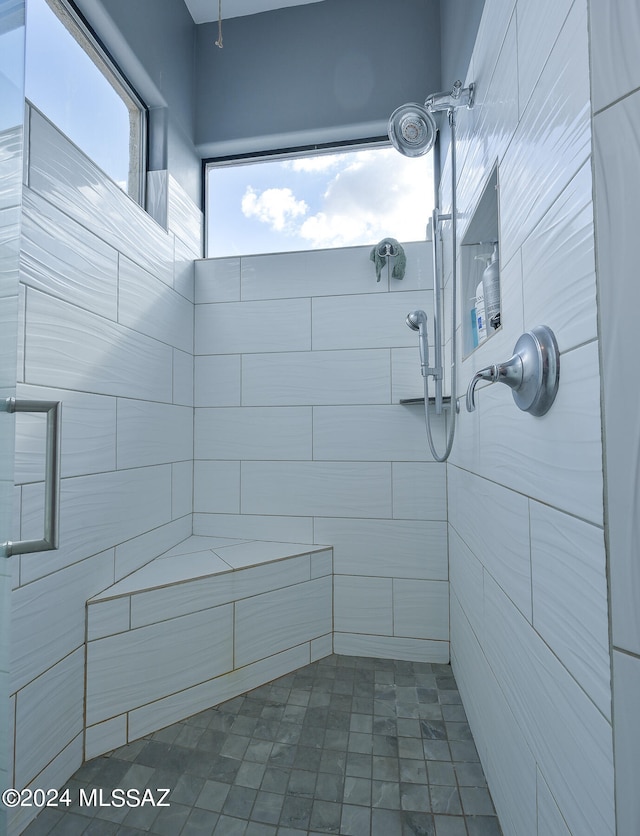 bathroom featuring tiled shower