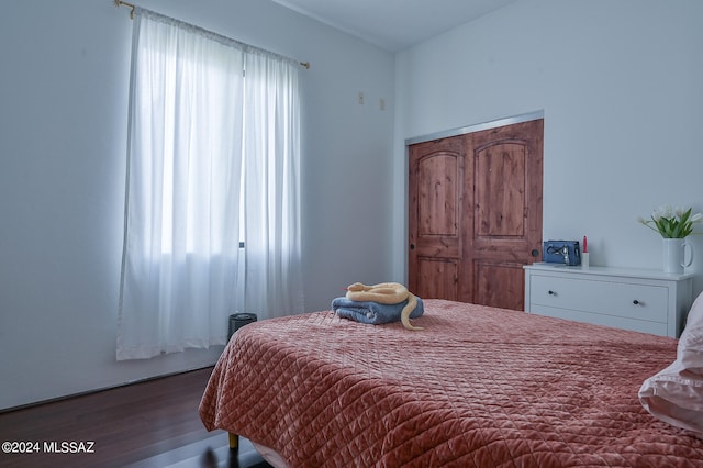 bedroom featuring hardwood / wood-style flooring