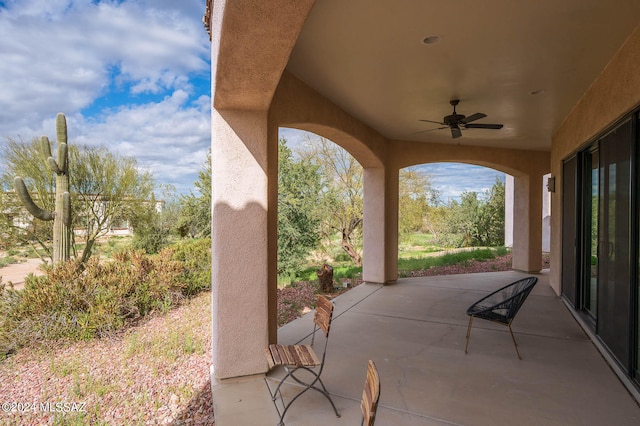 view of patio / terrace featuring ceiling fan