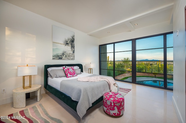 bedroom featuring access to outside and tile patterned flooring