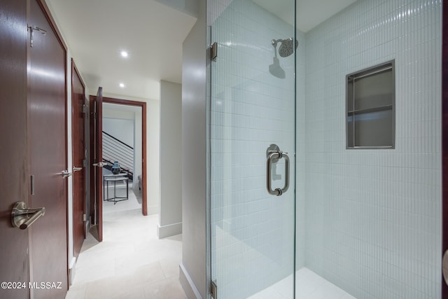 bathroom featuring an enclosed shower