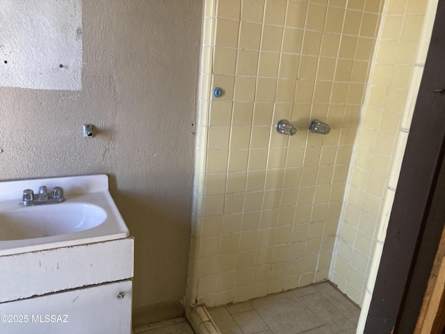 bathroom with vanity and tile patterned floors