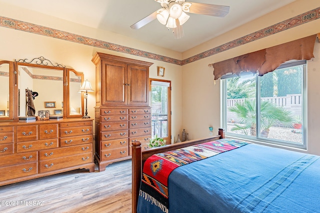 bedroom featuring light wood-type flooring and ceiling fan