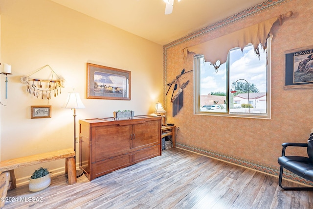 sitting room with light hardwood / wood-style flooring