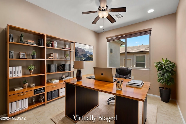 tiled office space with ceiling fan