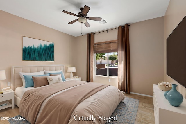 bedroom featuring ceiling fan