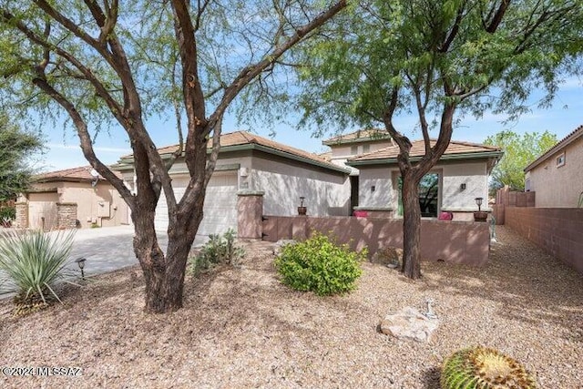 view of front of home featuring a garage