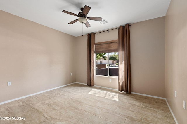 unfurnished room featuring ceiling fan