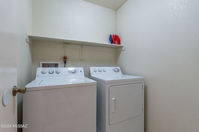 laundry room featuring independent washer and dryer