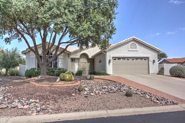 single story home with a garage