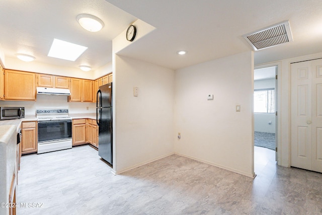 kitchen with light brown cabinetry, black fridge, white electric range, and a skylight