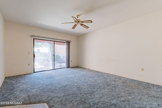 empty room featuring carpet floors and ceiling fan