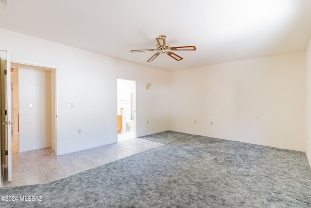 carpeted empty room with ceiling fan