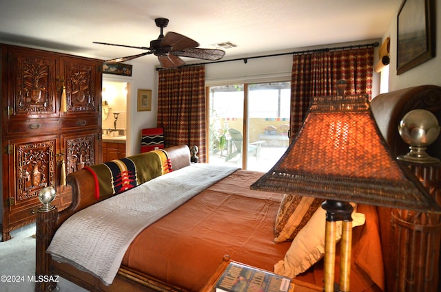 bedroom featuring ceiling fan, carpet floors, ensuite bath, and access to exterior