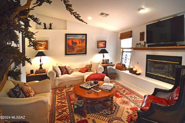 living room with vaulted ceiling