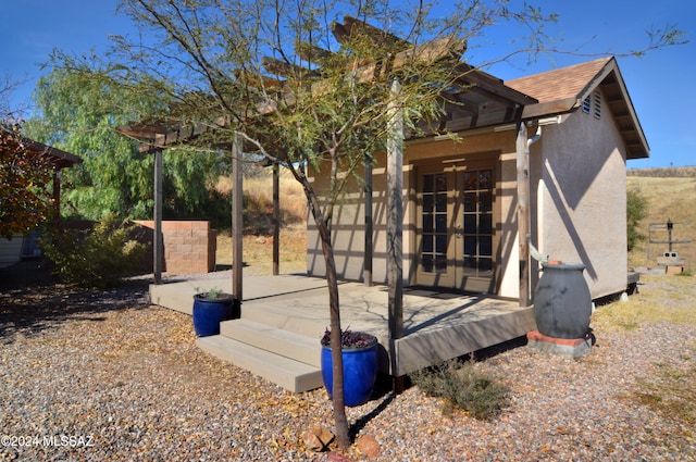 view of home's exterior featuring french doors