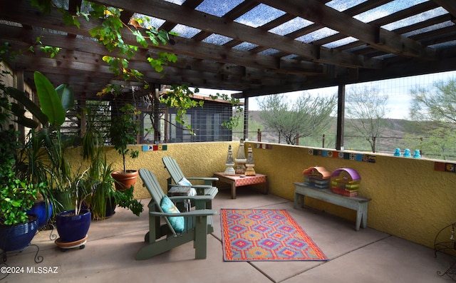 view of patio / terrace featuring a pergola