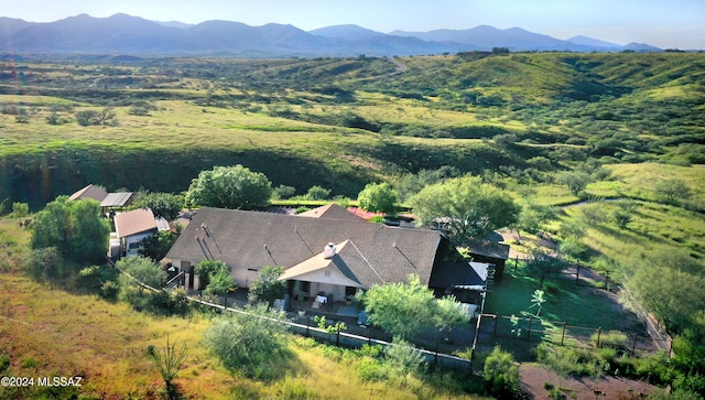 drone / aerial view featuring a mountain view