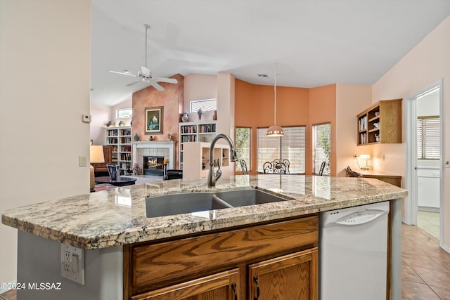63156 E Flower Ridge Dr, Saddlebrooke, AZ 85739 - kitchen with dishwasher, a sink, lofted ceiling, open floor plan, and a ceiling fan