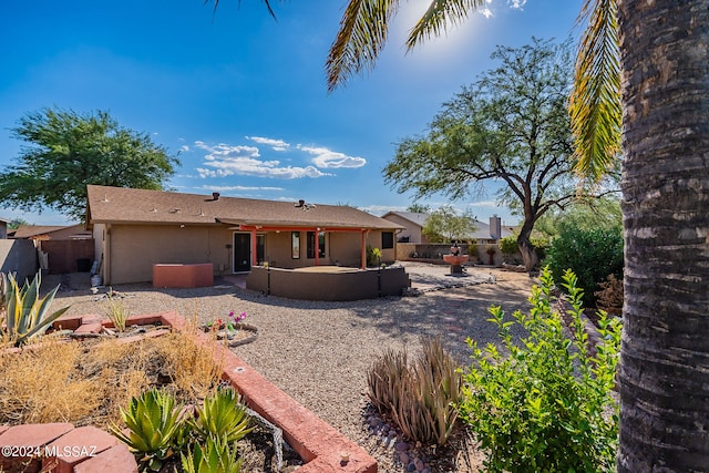 rear view of property with a patio