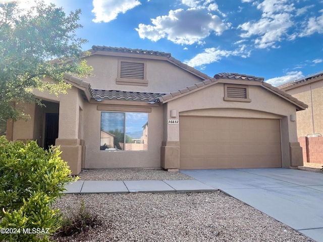 view of front of home featuring a garage