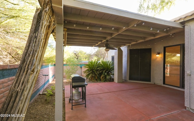 view of patio / terrace featuring ceiling fan and grilling area