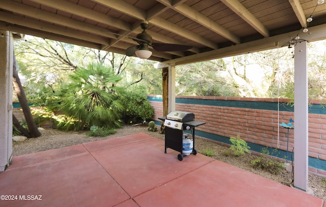 view of patio with ceiling fan and a grill