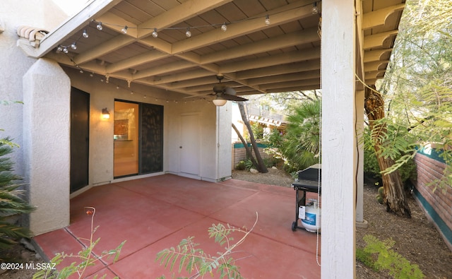 view of patio featuring ceiling fan and grilling area